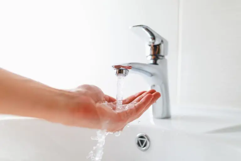 hands washing touchless bathroom faucet